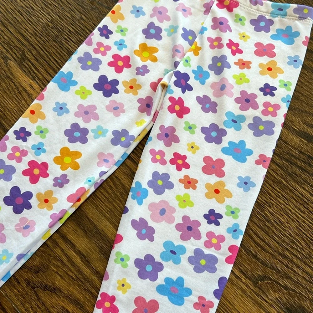 Social Butterfly white leggings with rainbow hearts toddler girl